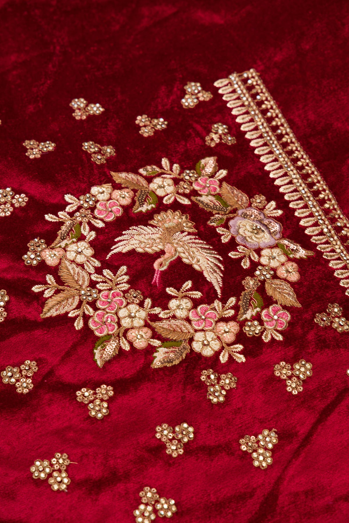 Close up blouse image of Red Banarasi Raw Silk Womens Lehenga set featuring Embroidered Choli paired with Pink Embroidered Skirt with Embroidered Border and a Embroidered dupatta in Pink