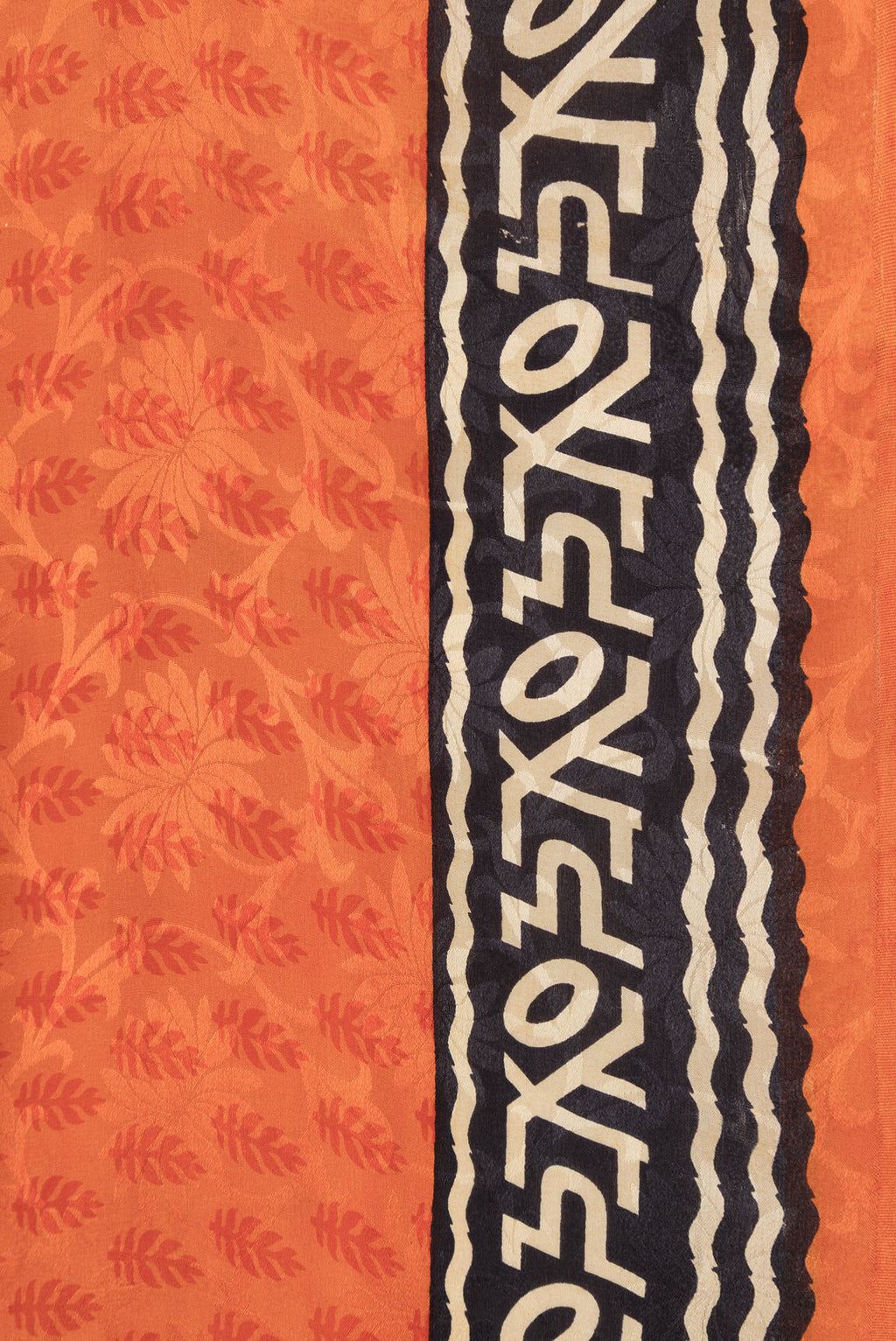 Border image of Orange Dual Tone Mysore Crepe Saree with Printed design on the body and Printed Border. 