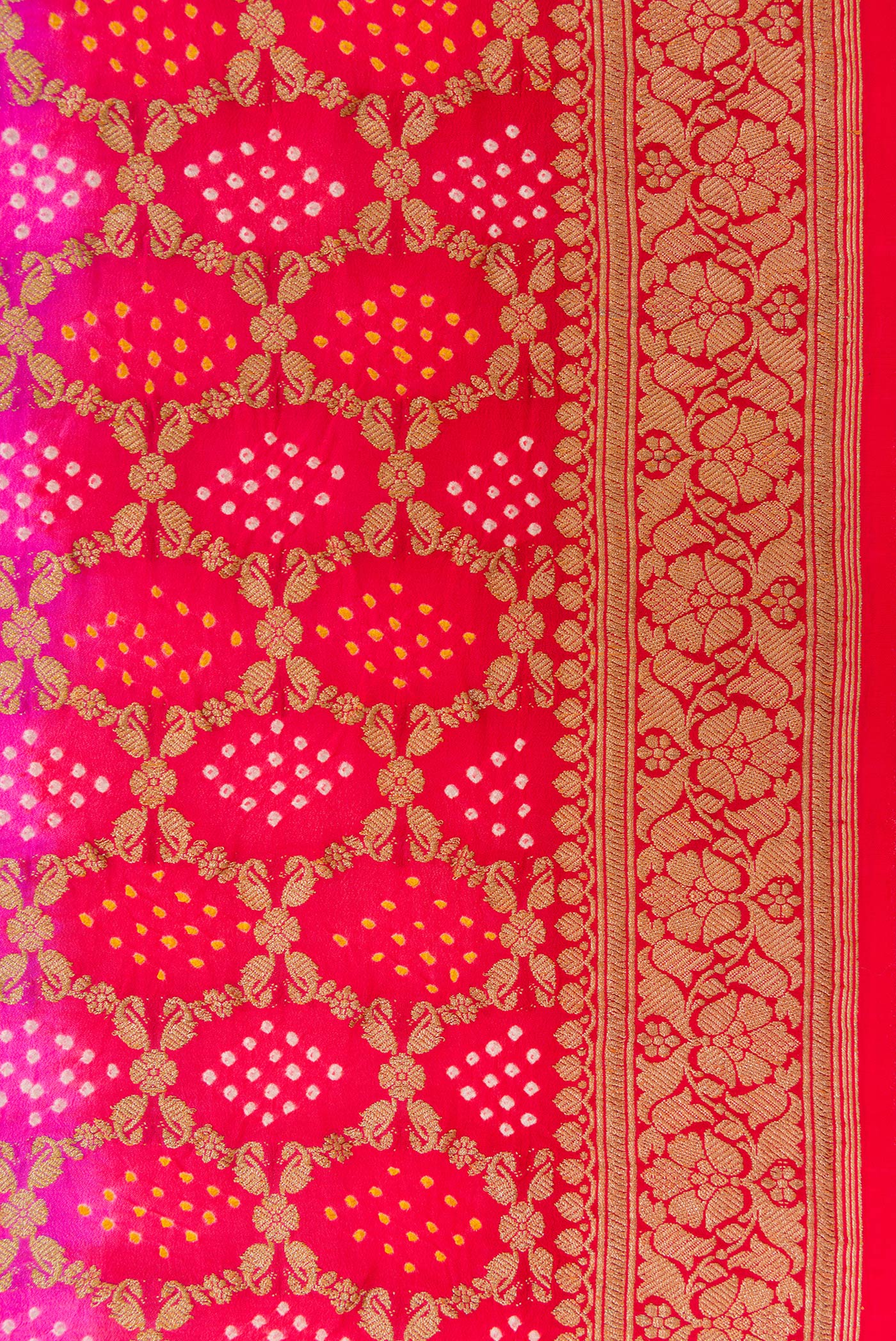 Border image of Pink and Red Color Banarasi Georgette Saree with Bandhani Print on the body and Zari Border. 