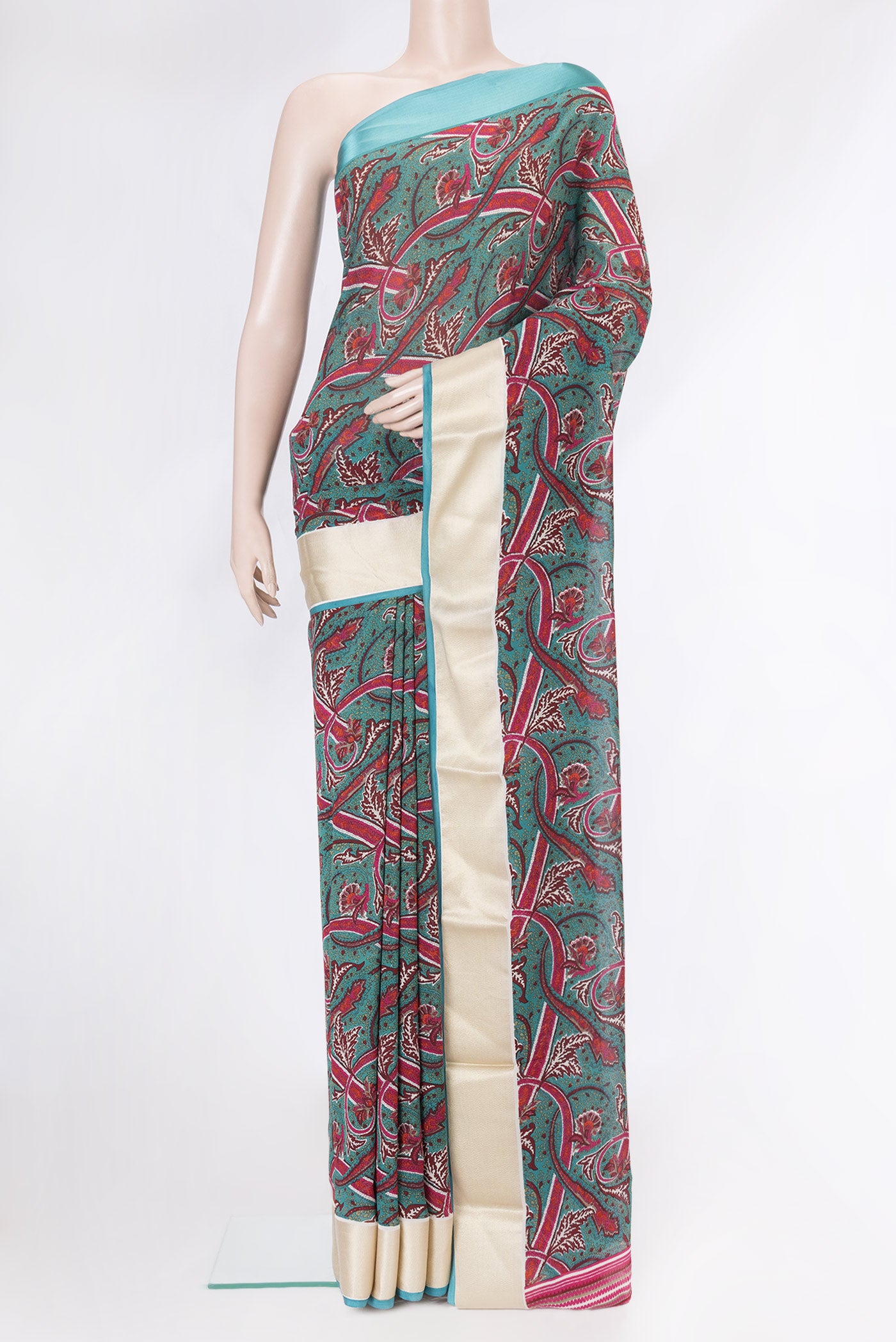 Green Dual Tone Mysore Georgette Saree with Printed design on the body and Plain Border.  displayed on a mannequin