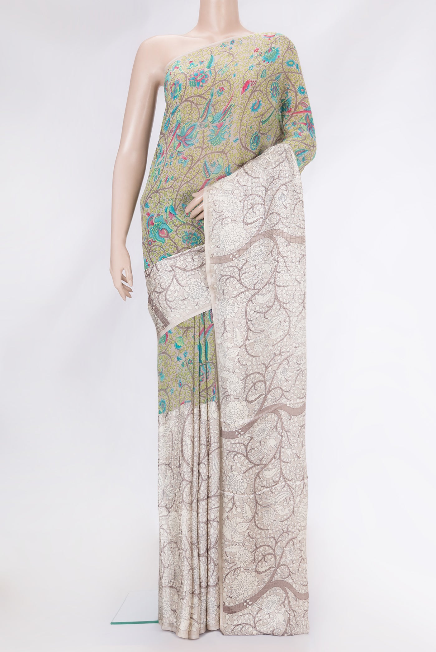 Grey Dual Tone Mysore Crepe Saree with Printed design on the body and Without Border.  displayed on a mannequin