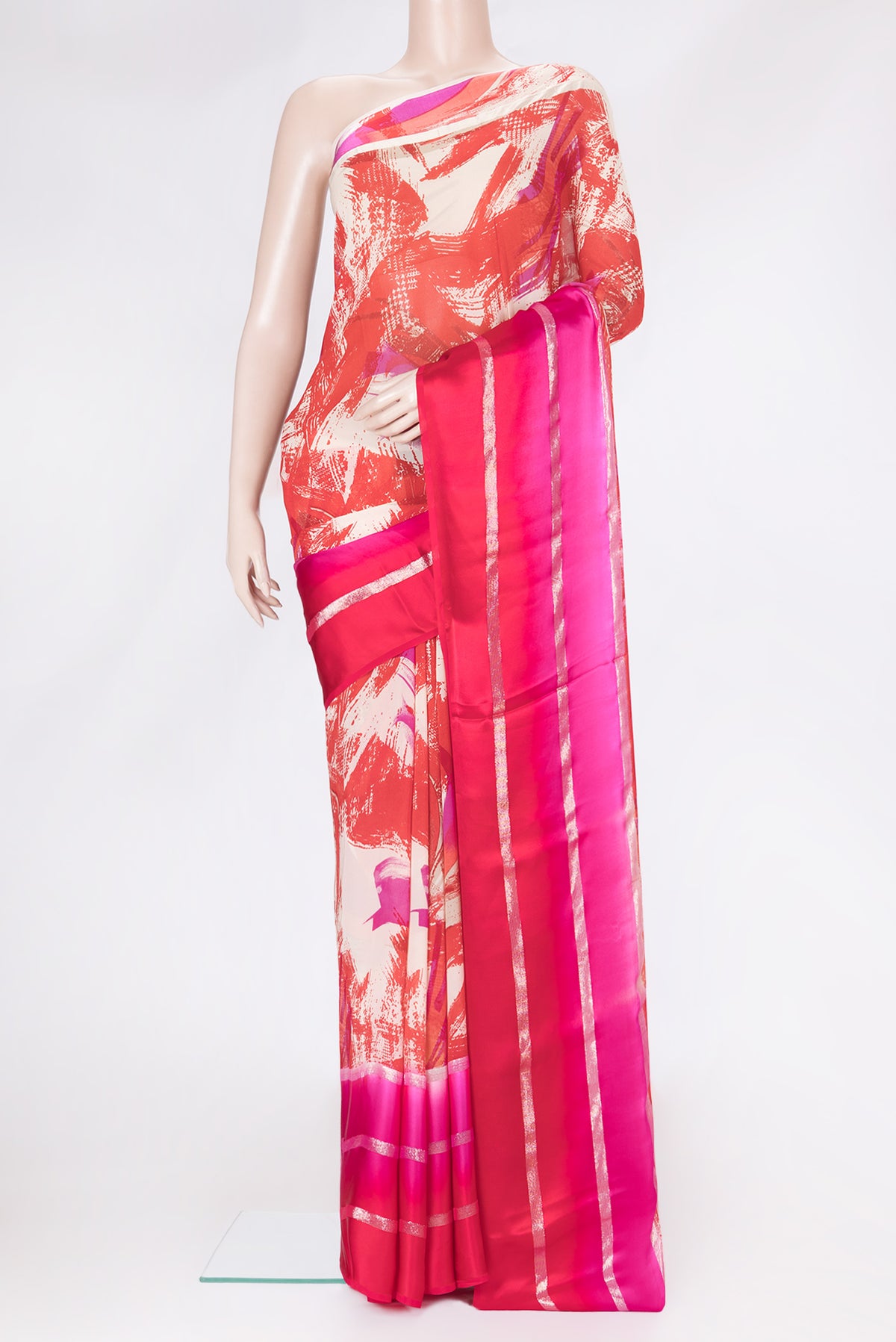 Red Dual Tone Mysore Georgette Saree with Printed design on the body and Zari Border.  displayed on a mannequin