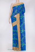 Parrot Green Dual Tone Mysore Chiffon Saree with Printed design on the body and Zari Border.  displayed on a mannequin