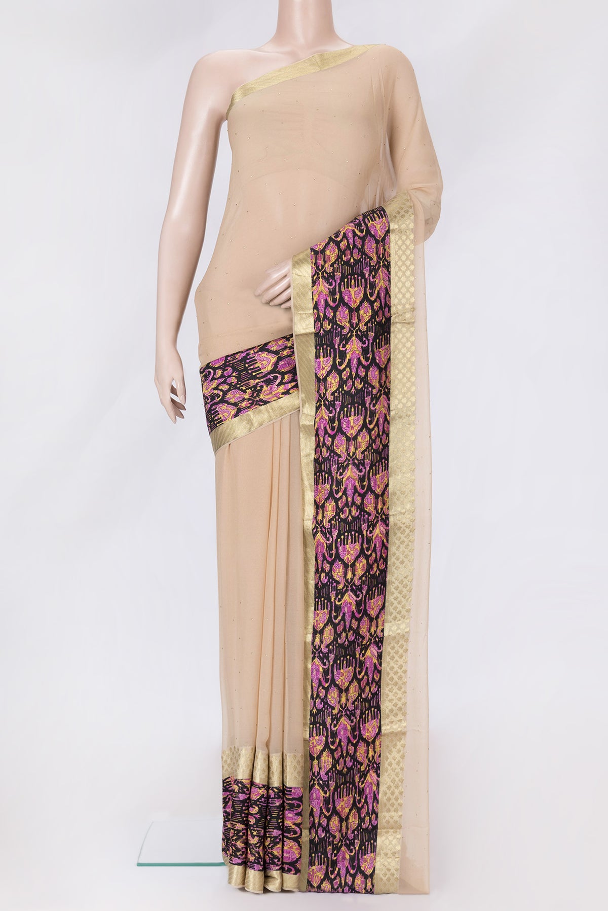 Beige Dual Tone Mysore Chiffon Saree with Embroidery on the body and Fancy Border.  displayed on a mannequin