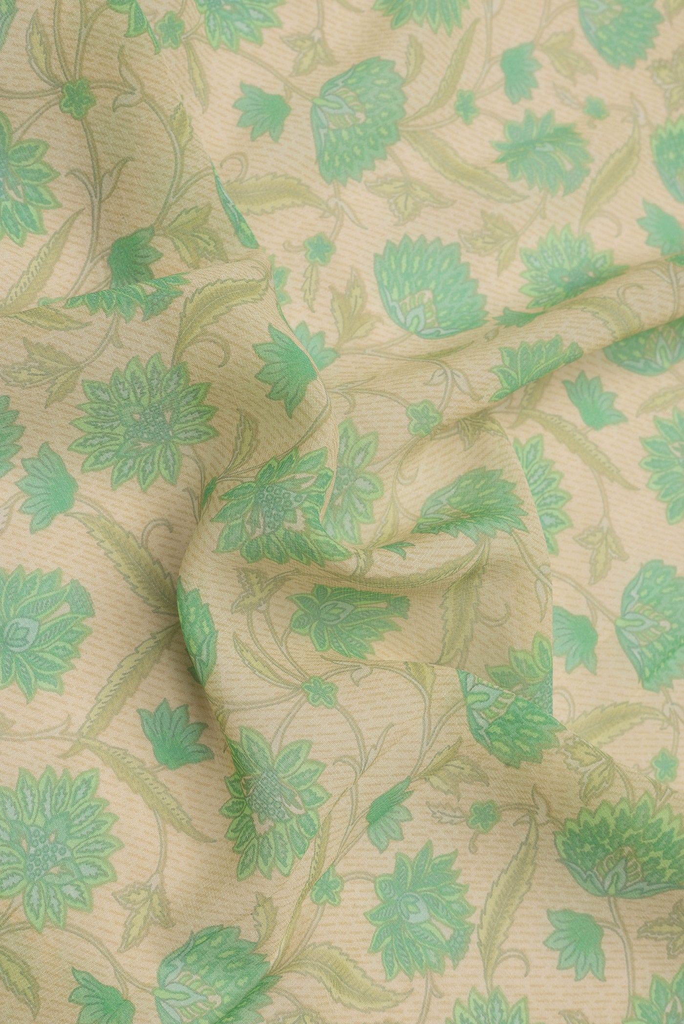 Close up of Sandal Dual Tone Mysore Georgette Saree with Printed design on the body and Zari Border.  displaying folds