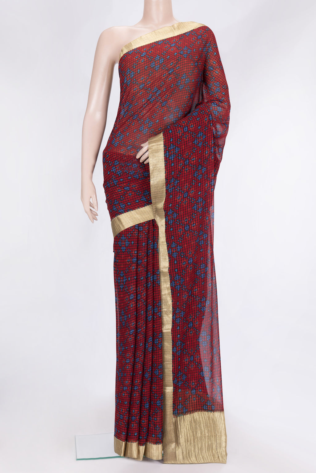 Maroon Dual Tone Mysore Georgette Saree with Printed design on the body and Zari Border.  displayed on a mannequin