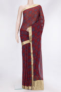 Maroon Dual Tone Mysore Georgette Saree with Printed design on the body and Zari Border.  displayed on a mannequin