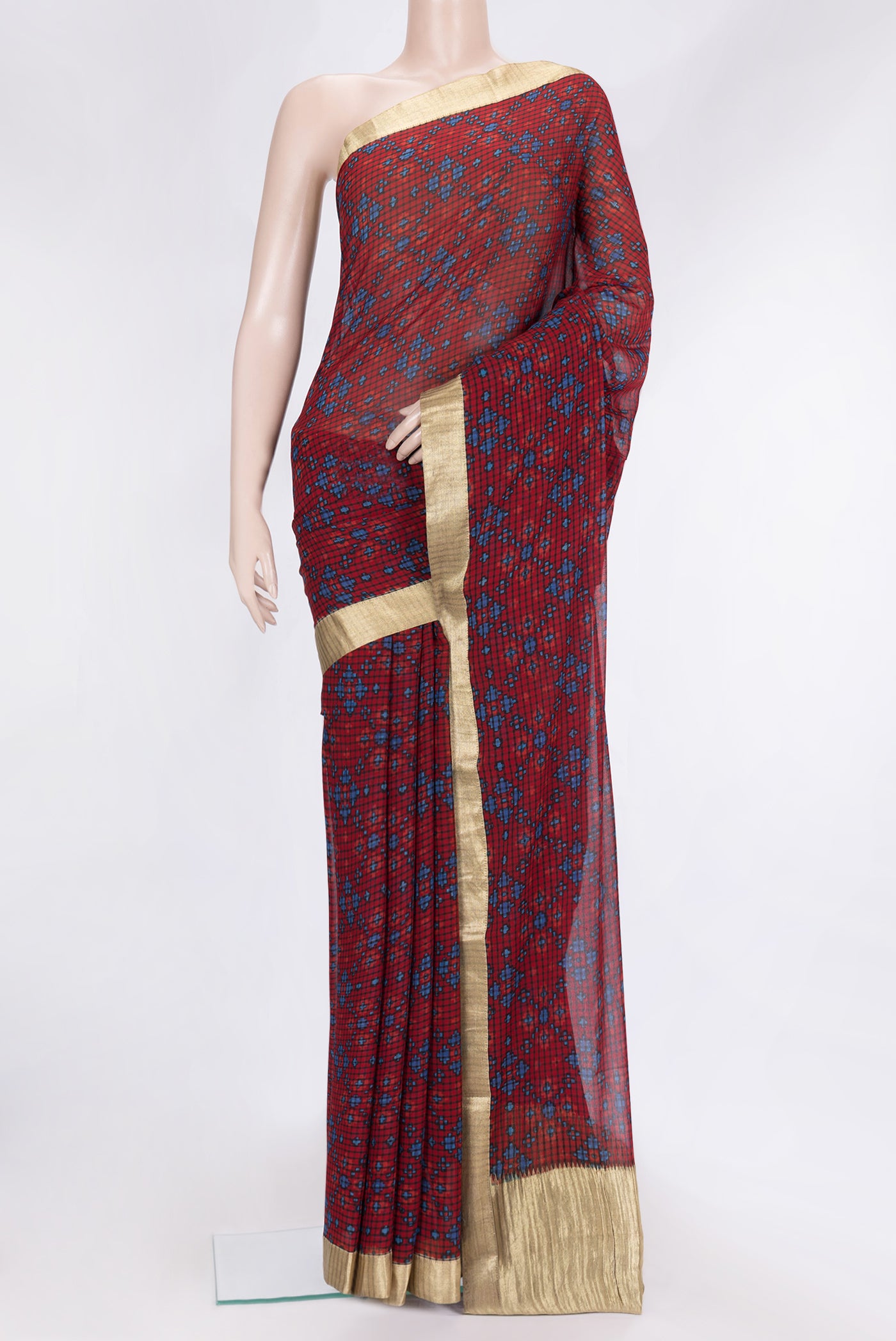 Maroon Dual Tone Mysore Georgette Saree with Printed design on the body and Zari Border.  displayed on a mannequin
