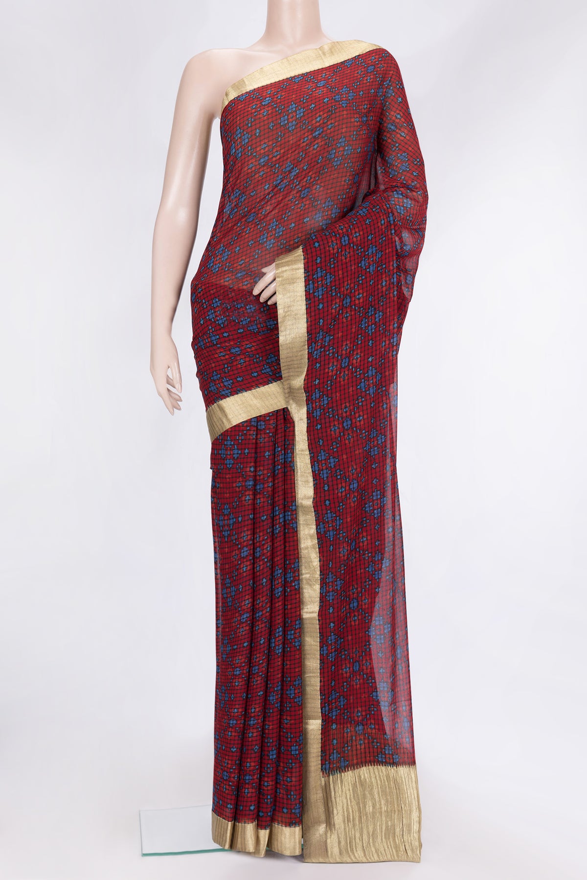Maroon Dual Tone Mysore Georgette Saree with Printed design on the body and Zari Border.  displayed on a mannequin