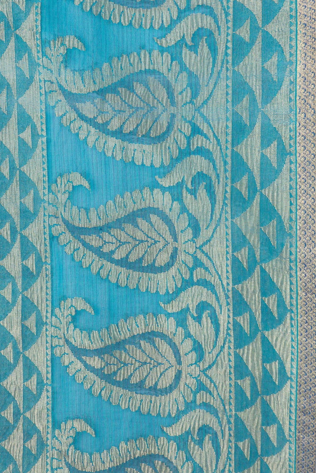 Border image of Sky Blue Dual Tone Mysore Georgette Saree with Zari Butta on the body and Zari Border. 