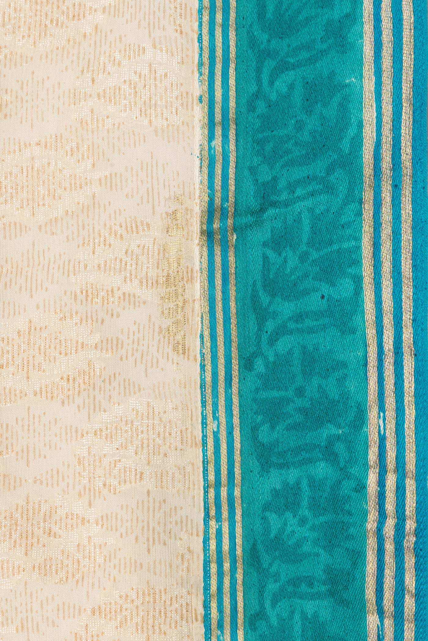 Border image of Beige Dual Tone Mysore Georgette Saree with Zari Butta on the body and Zari Border. 