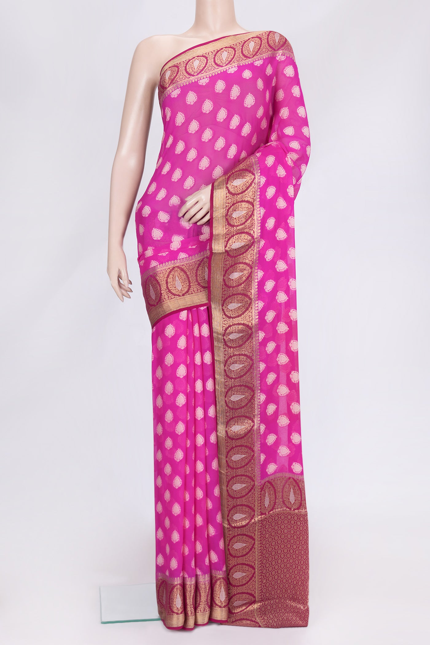 Pink Dual Tone Mysore Georgette Saree with Zari Butta on the body and Thread Border.  displayed on a mannequin