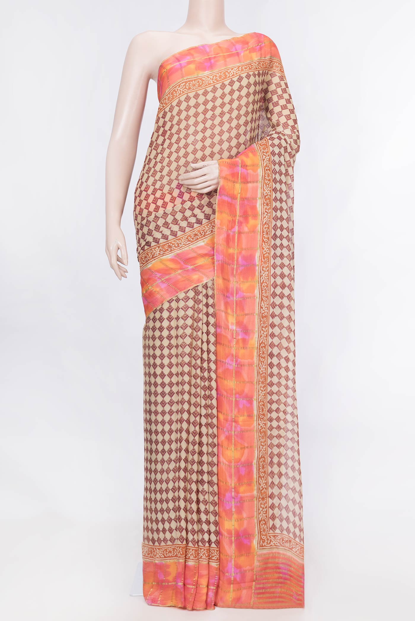 Beige Dual Tone Mysore Georgette Saree With Printed design on the body and Zari Border displayed on a mannequin