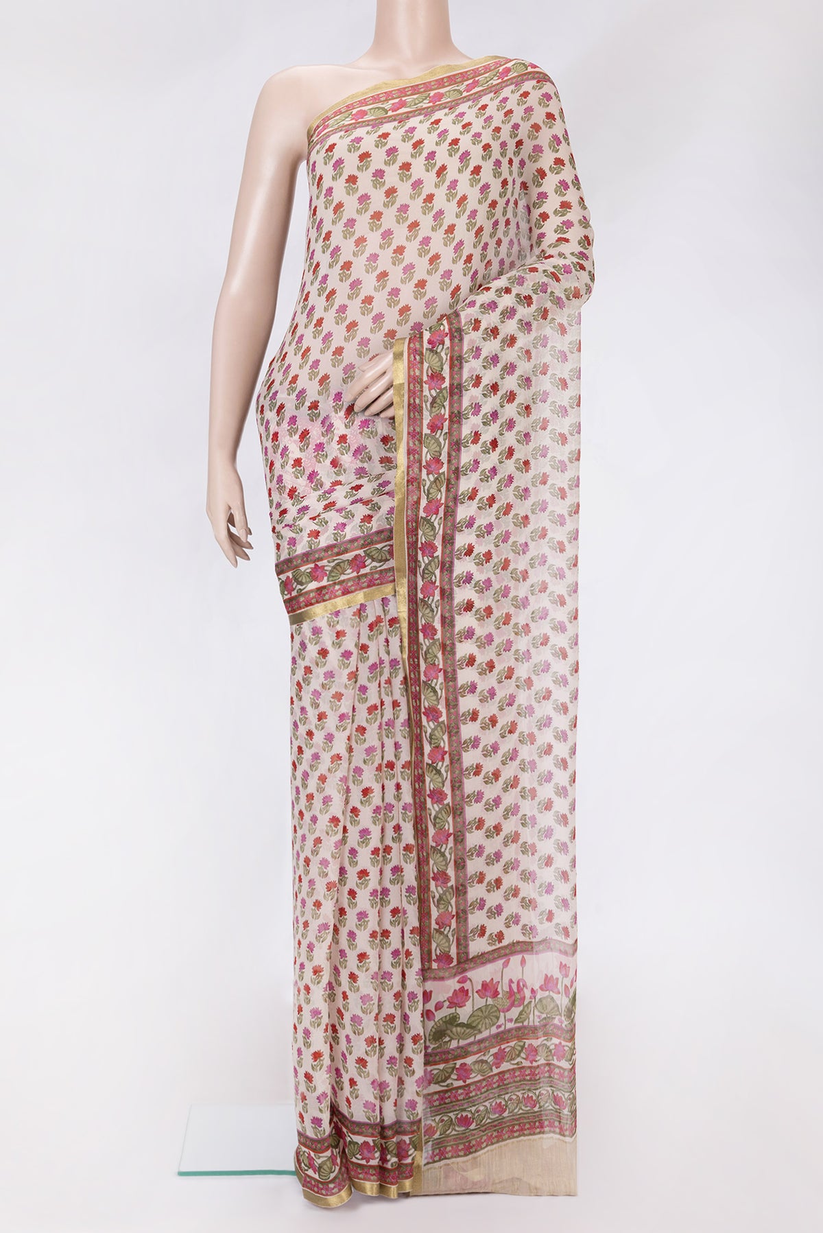 Beige Dual Tone Chiffon Saree with Printed design on the body and Zari Border.  displayed on a mannequin