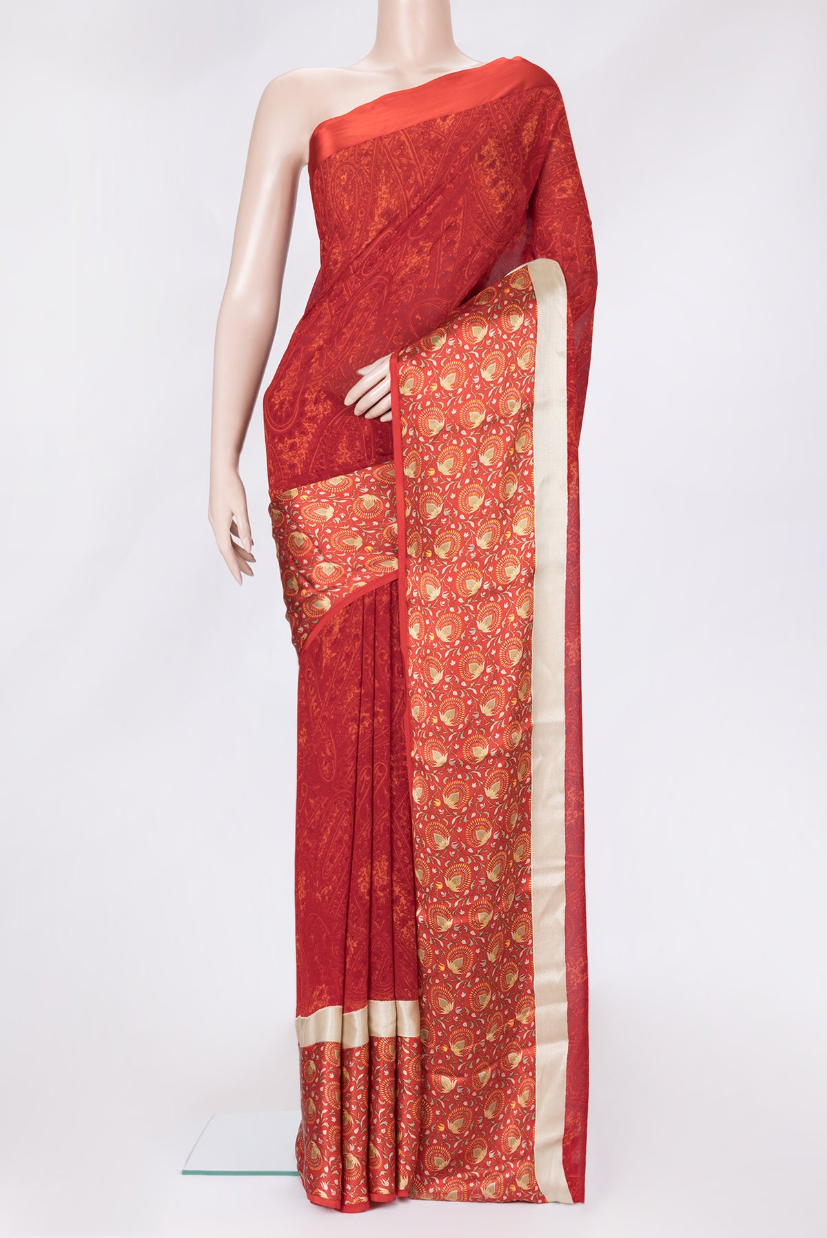 Red Dual Tone Mysore Crepe Saree with Printed design on the body and Printed Border.  displayed on a mannequin