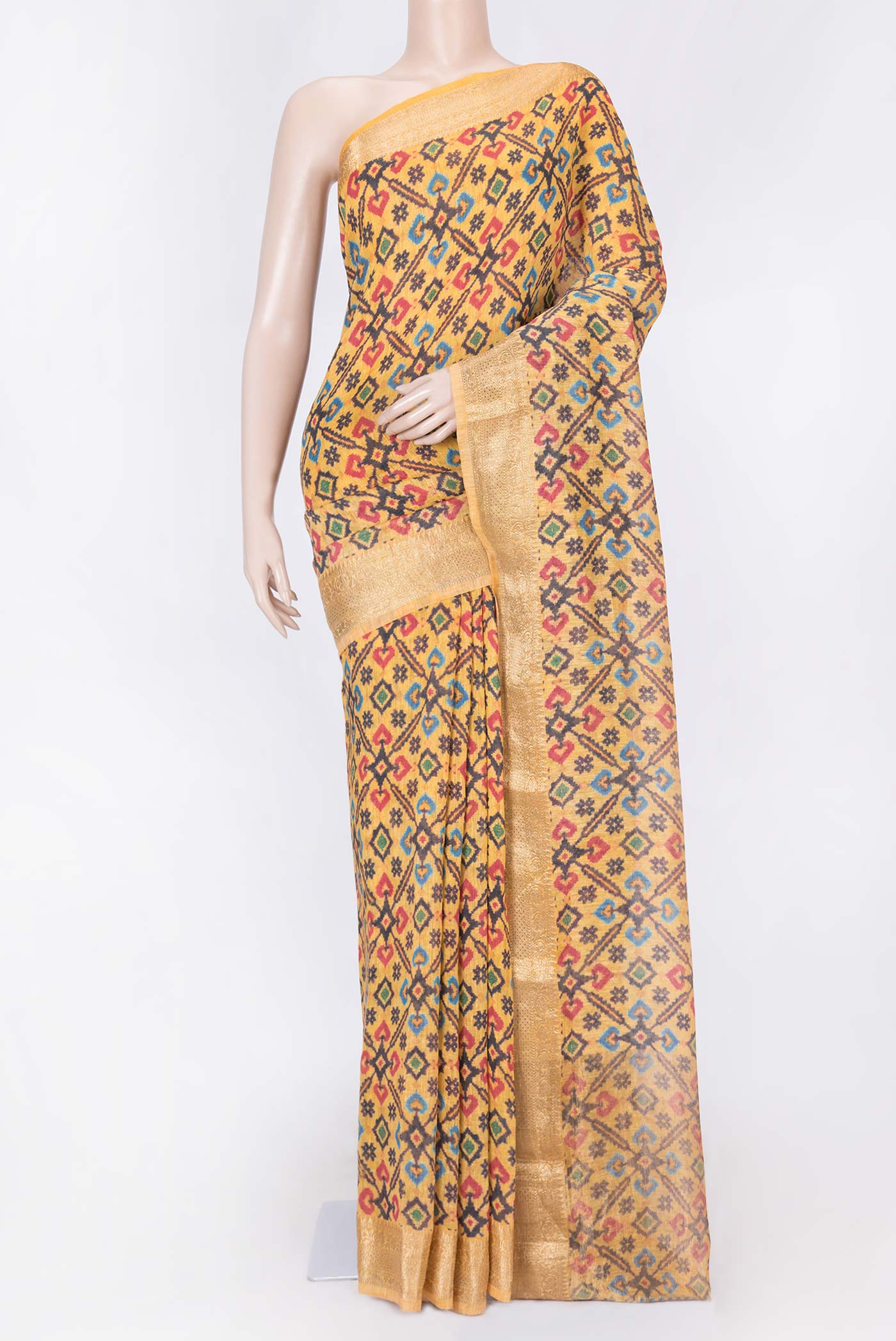 Yellow Dual Tone Linen Saree with Printed design on the body and Zari Border displayed on a mannequin