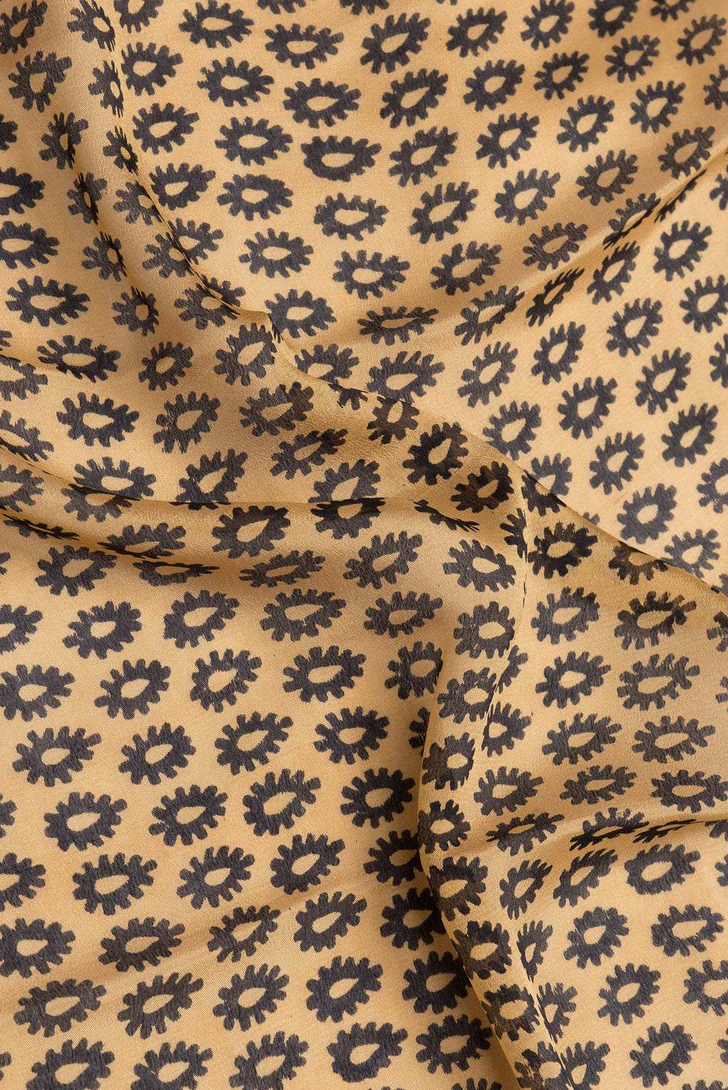 Close up of Sandal Dual Tone Crepe Saree with Printed design on the body and Printed Border.  displaying folds