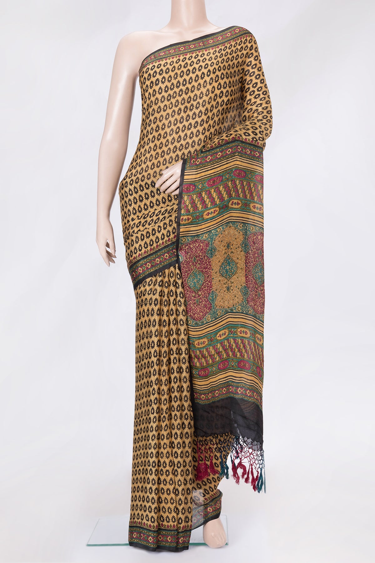 Sandal Dual Tone Crepe Saree with Printed design on the body and Printed Border.  displayed on a mannequin