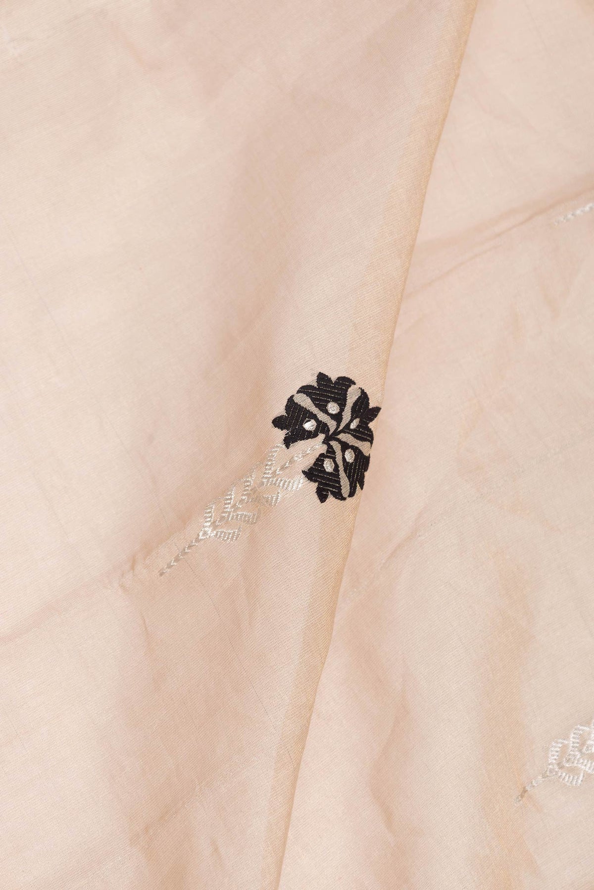 Close up of Beige Dual Tone Banarasi Saree with Zari Brocade on the body and Zari Border displaying folds