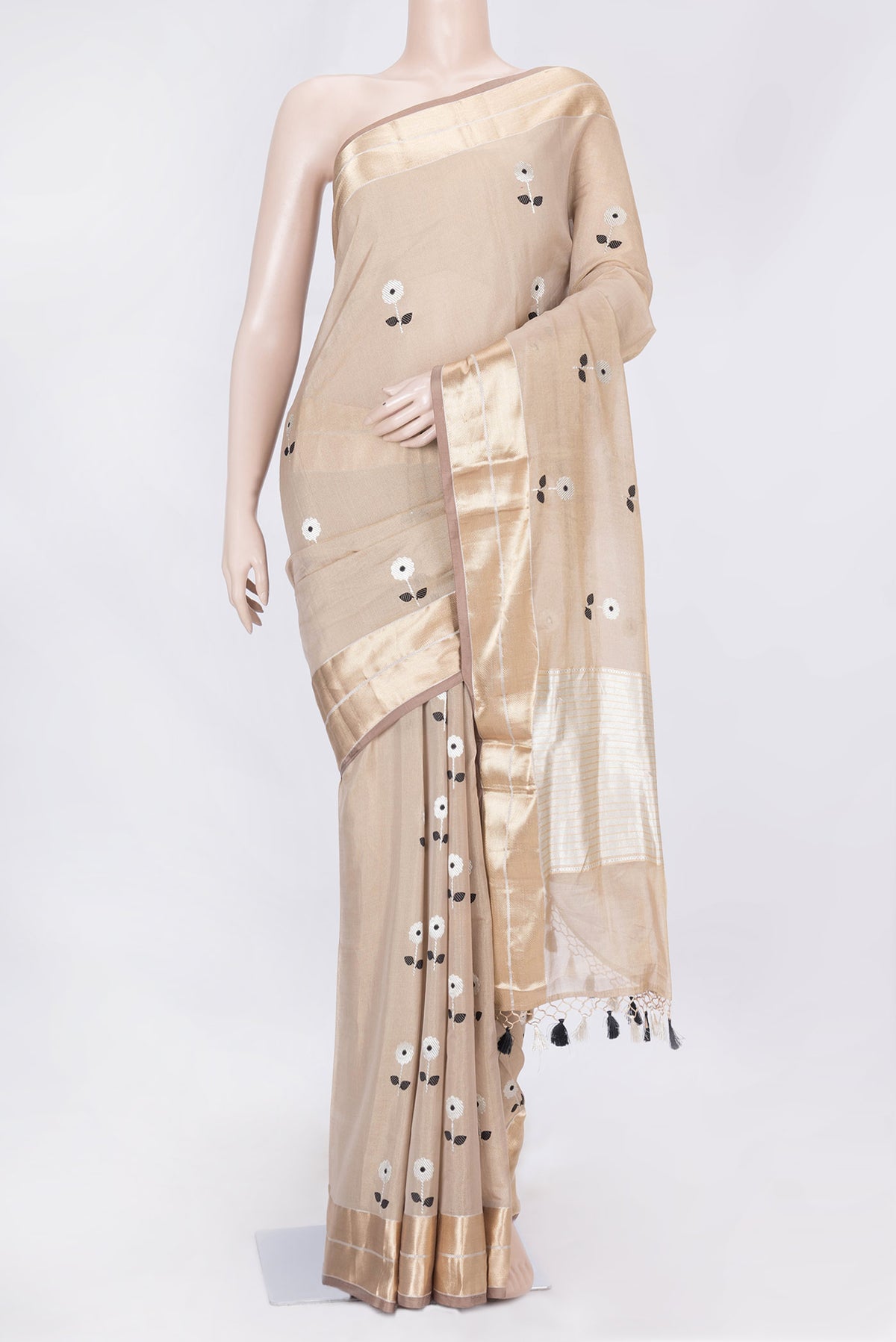 Beige Dual Tone Banarasi Saree with Zari Brocade on the body and Zari Border displayed on a mannequin