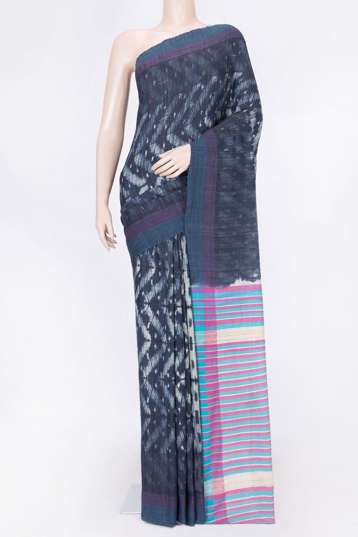 Navy Blue Dual Tone Tussar Silk Saree with Printed design on the body and Plain Border displayed on a mannequin