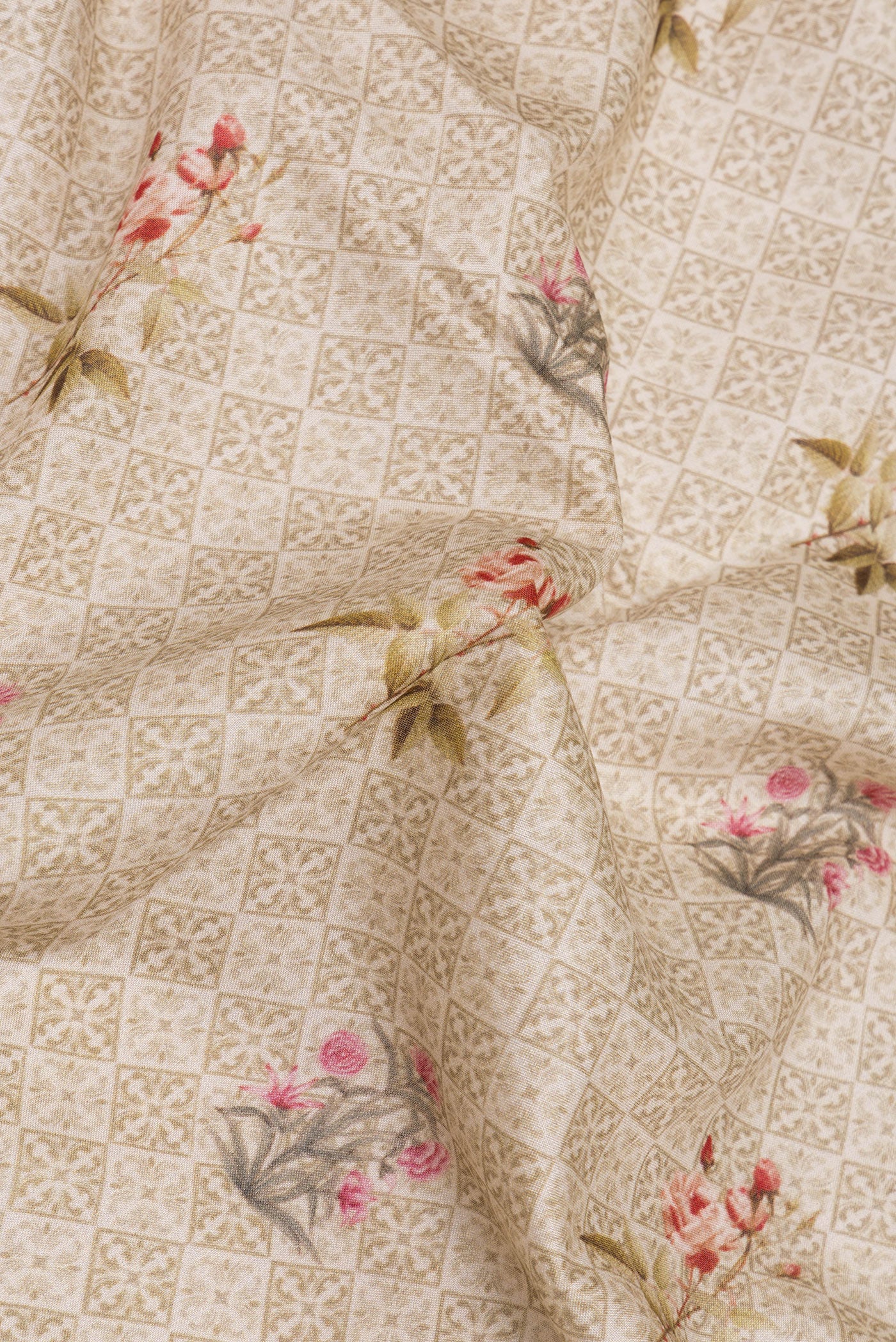 Close up of Beige Chanderi Silk Saree with Printed design on the body and Thread Border.  displaying folds