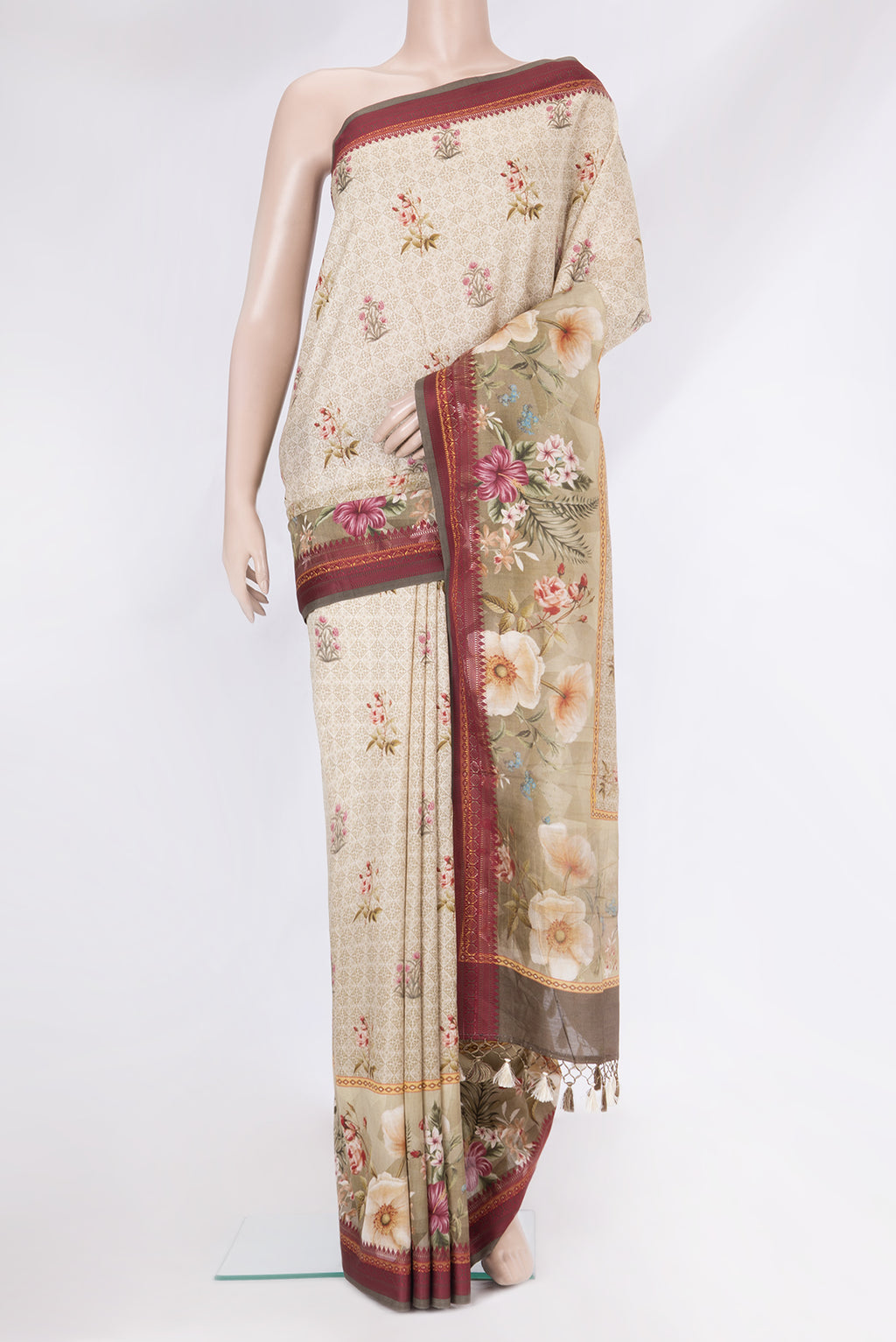 Beige Chanderi Silk Saree with Printed design on the body and Thread Border.  displayed on a mannequin