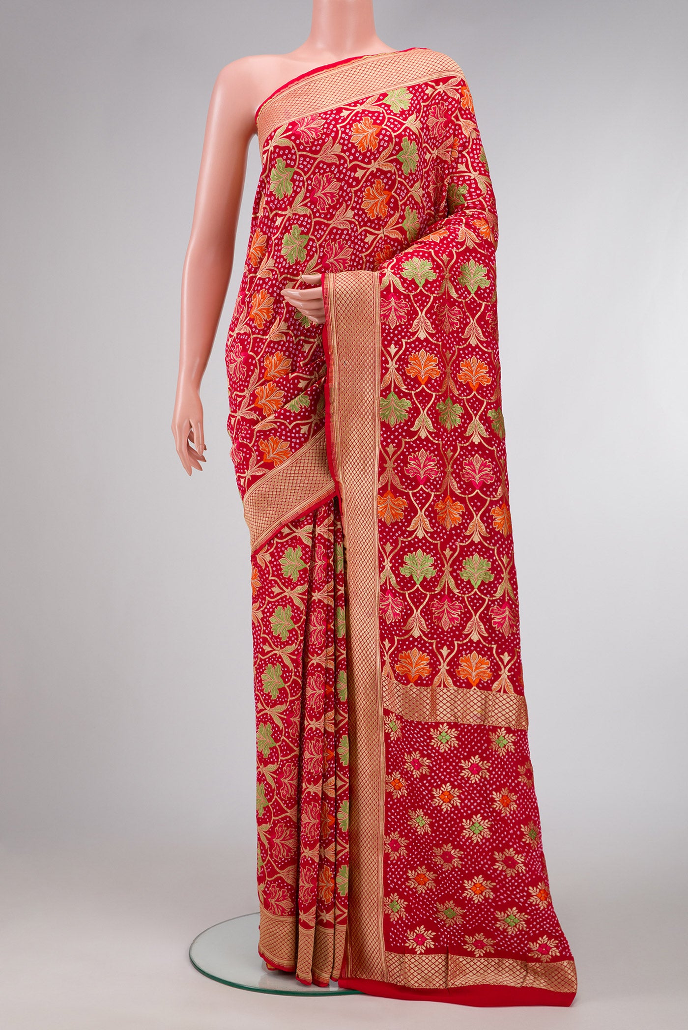 Red Dual Tone Banarasi Georgette Saree with Zari Brocade on the body and Zari Border.  displayed on a mannequin