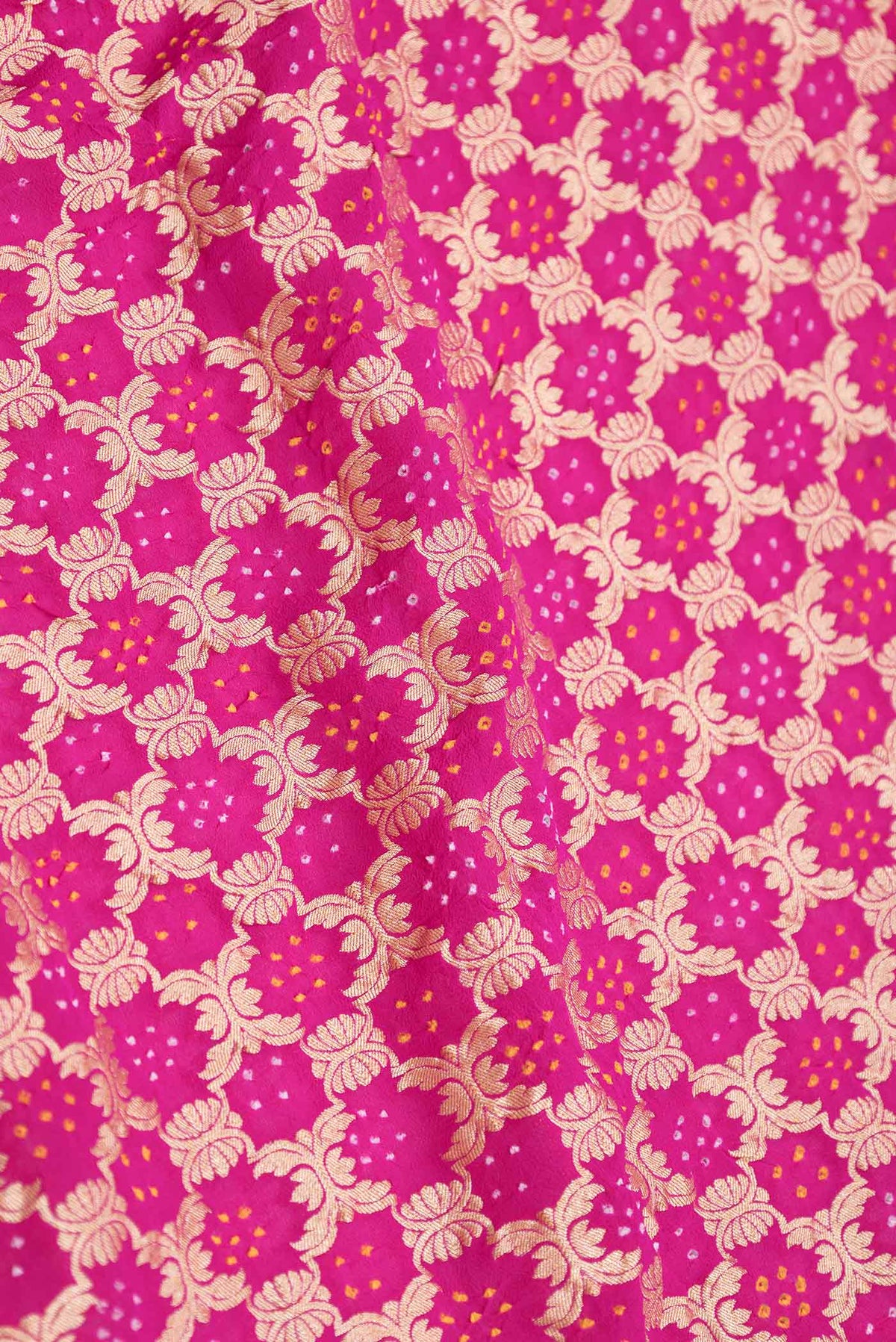 Close up of Pink Dual Tone Banarasi Georgette Saree with Zari Brocade on the body and Zari Border displaying folds