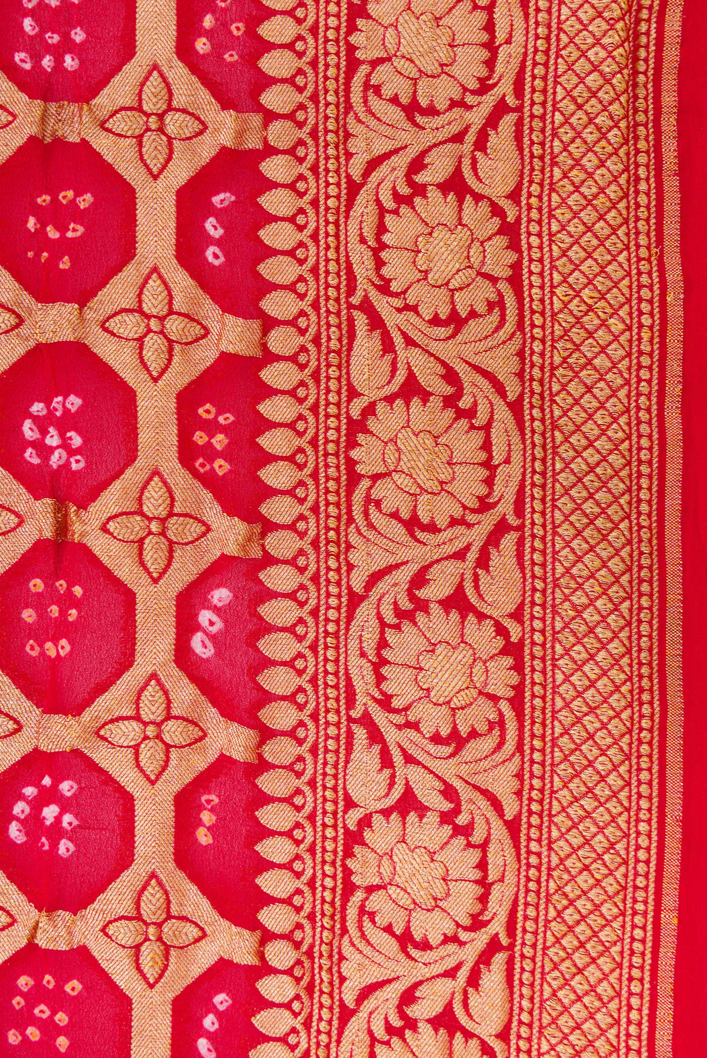 Border image of Pink and Red Color Bandhani Silk Saree with Bandhani Print on the body and Zari Border. 