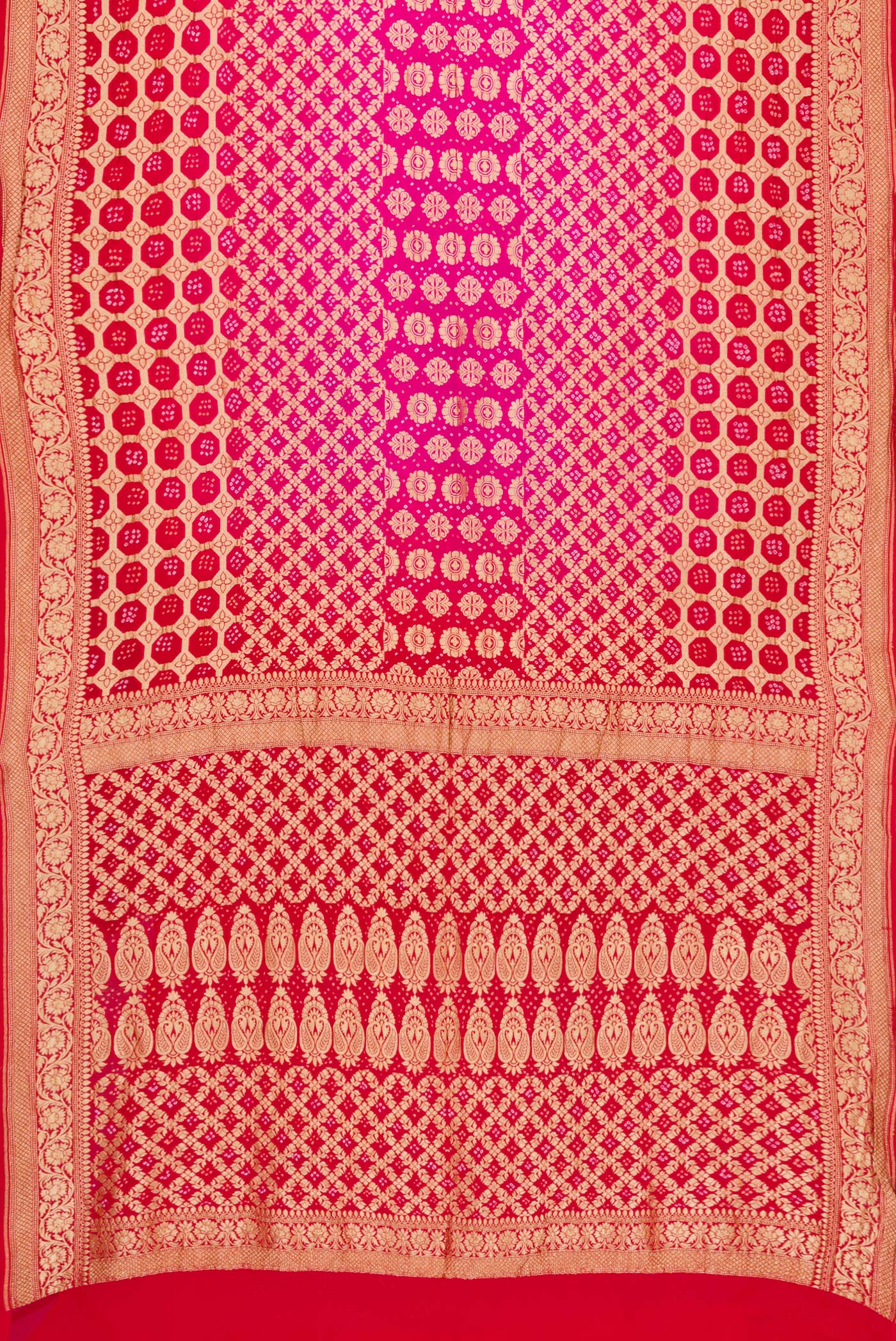 Flat view of Pink and Red Color Bandhani Silk Saree with Bandhani Print on the body and Zari Border. 