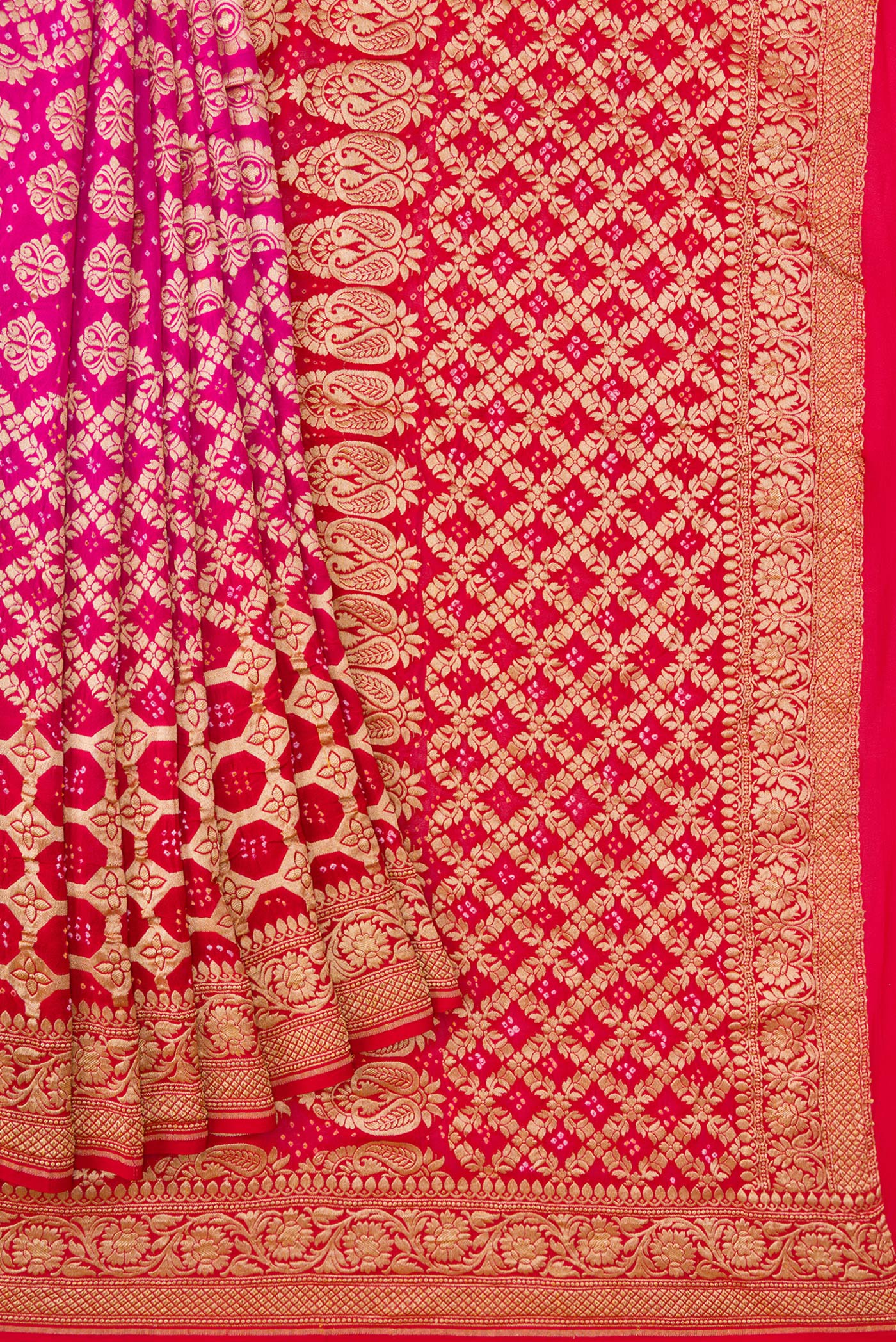 Pleats and pallu of Pink and Red Color Bandhani Silk Saree with Bandhani Print on the body and Zari Border. 