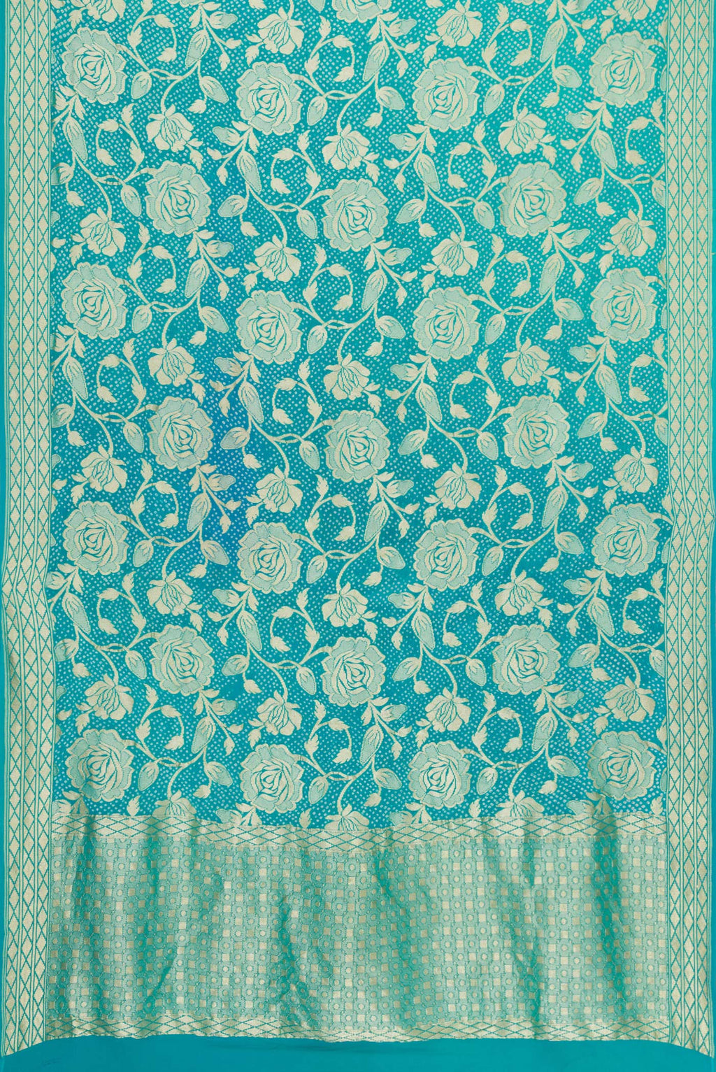 Flat view of Sky Blue Dual Tone Bandhani Silk Saree with Bandhani Print on the body and Zari Border. 