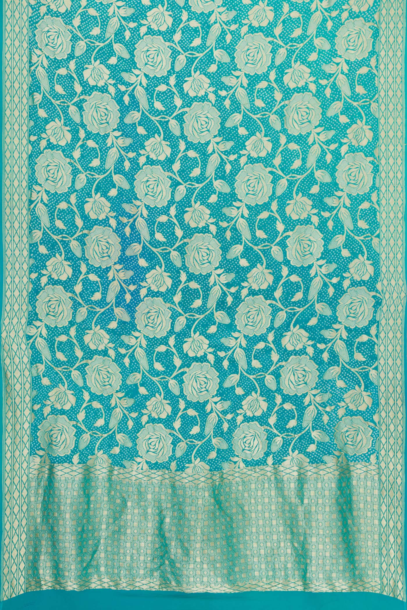 Flat view of Sky Blue Dual Tone Bandhani Silk Saree with Bandhani Print on the body and Zari Border. 