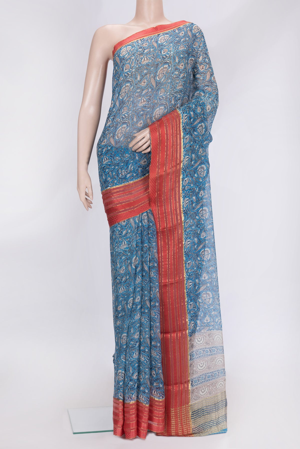 Peacock Blue Dual Tone Mysore Chiffon Saree with Printed design on the body and Zari Border.  displayed on a mannequin