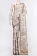Beige Dual Tone Mysore Georgette Saree With Printed design on the body and Zari Border displayed on a mannequin