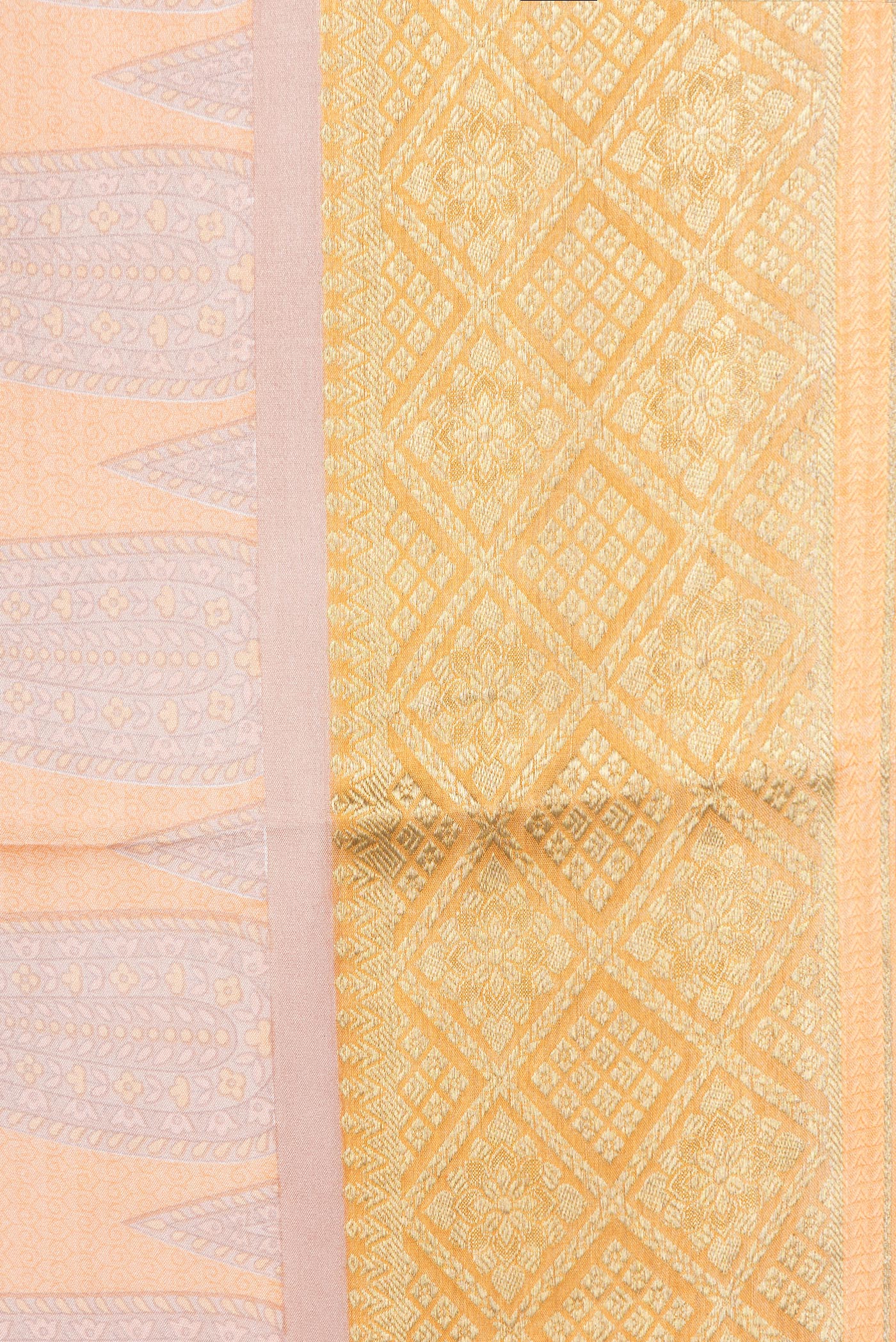 Border image of Peach Dual Tone Mysore Crepe Saree with Printed design on the body and Zari Border. 