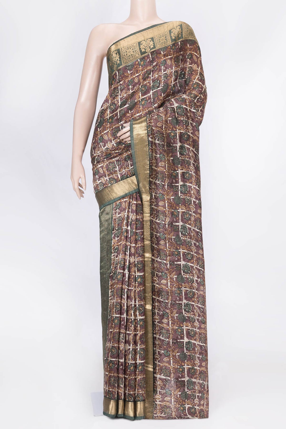 Brown Dual Tone Tussar Saree with Printed design on the body and Zari Border displayed on a mannequin