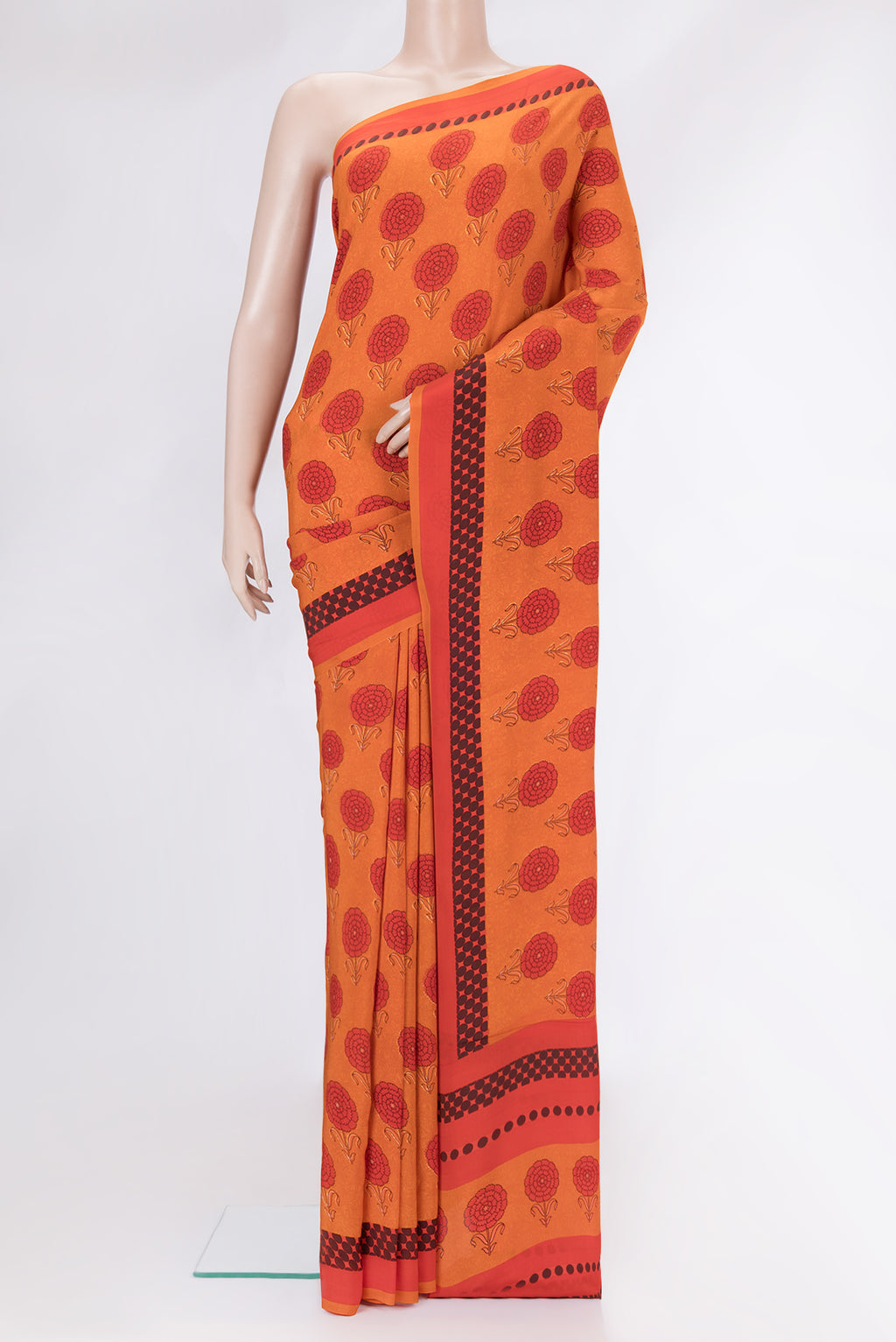 Orange Dual Tone Mysore Crepe Saree with Printed design on the body and Printed Border.  displayed on a mannequin