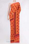 Orange Dual Tone Mysore Crepe Saree with Printed design on the body and Printed Border.  displayed on a mannequin