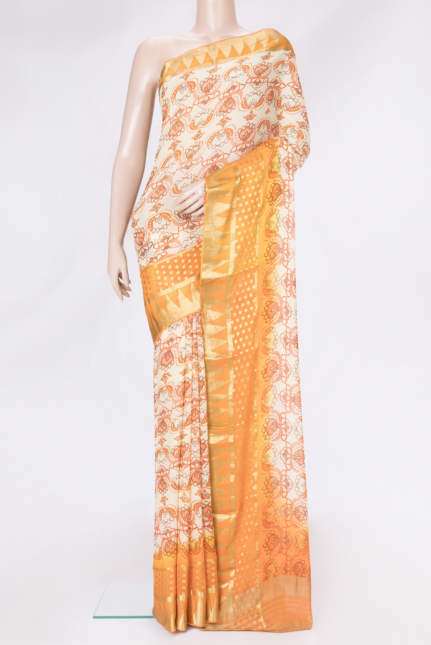 Beige Dual Tone Mysore Georgette Saree with Printed design on the body and Zari Border.  displayed on a mannequin