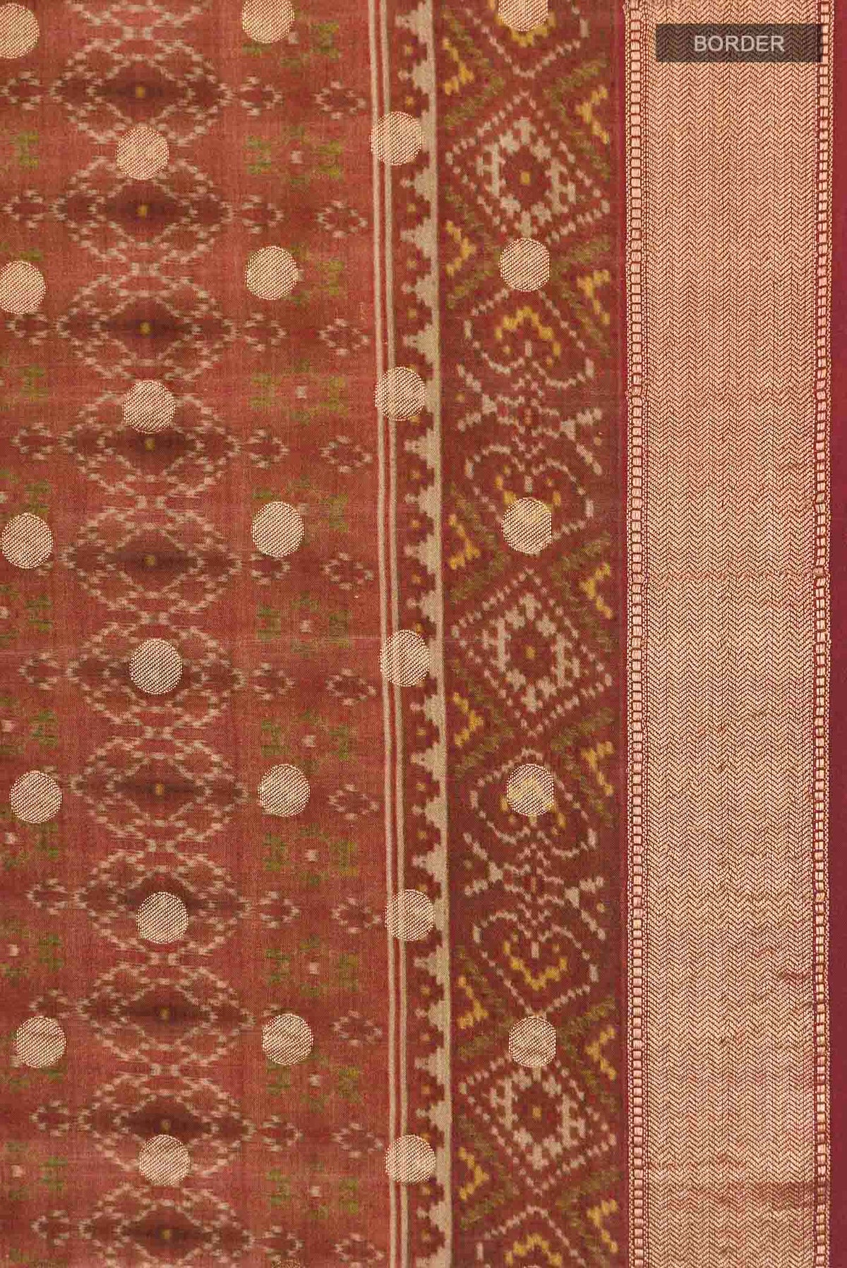 Border image of Rust Tussar Silk Saree with Printed design on the body and Zari Border