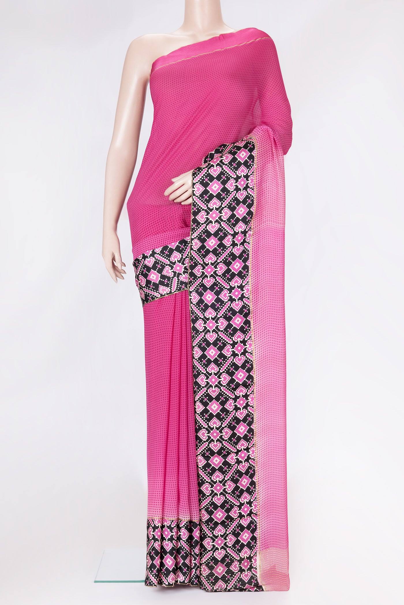 Pink Dual Tone Mysore Georgette Saree with Printed design on the body and Printed Border.  displayed on a mannequin