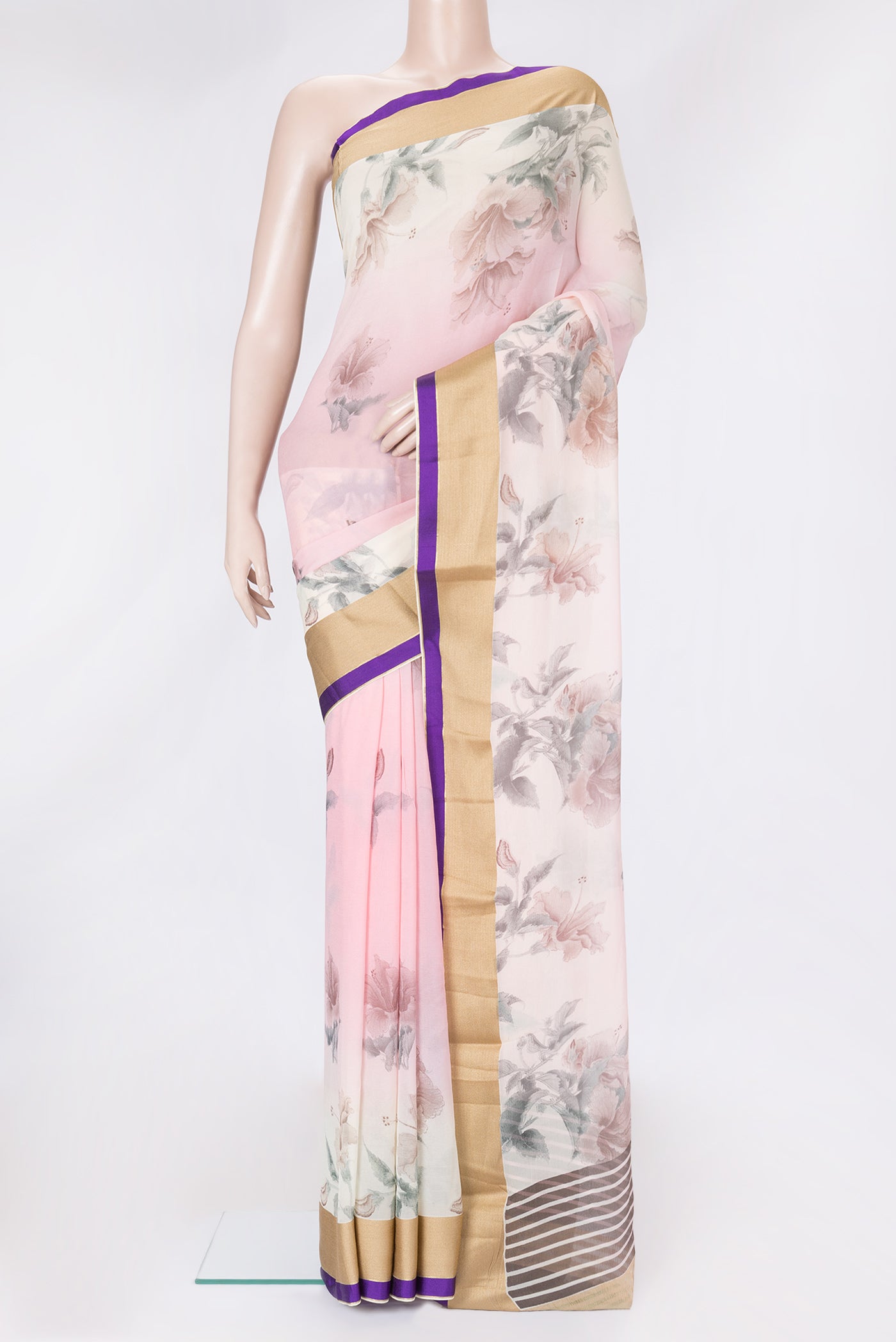 Pink Dual Tone Chiffon Saree with Printed design on the body and Zari Border.  displayed on a mannequin