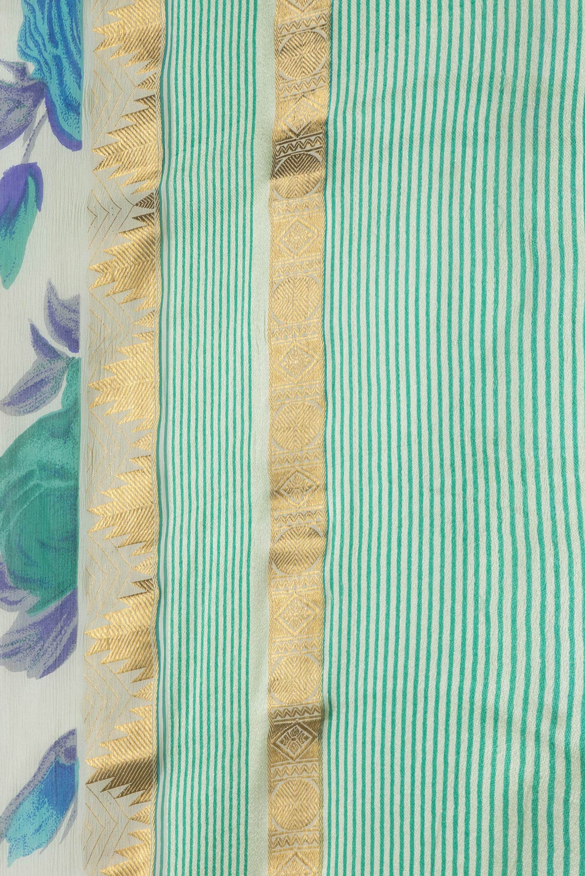 Border image of Pista Green Dual Tone Mysore Chiffon Saree with Printed design on the body and Zari Border. 