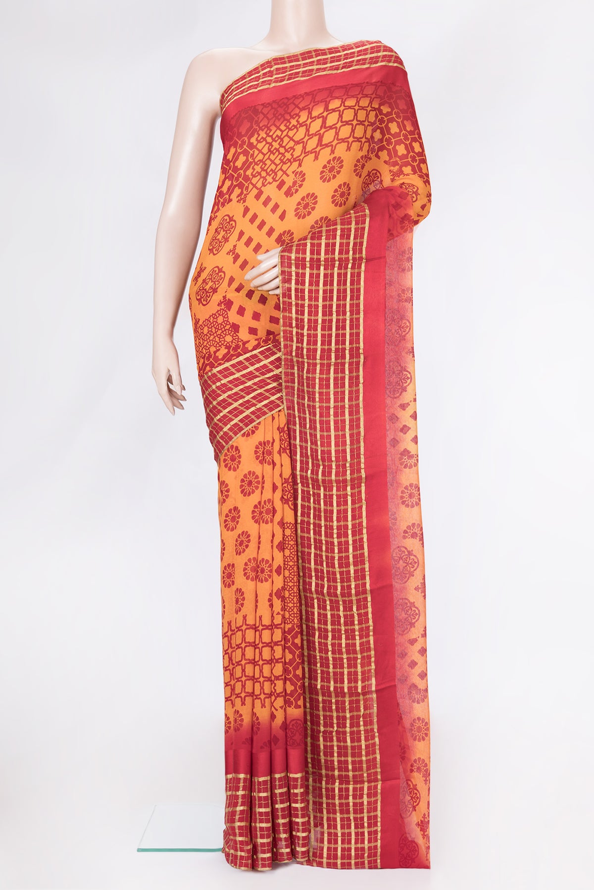 Orange Dual Tone Chiffon Saree with Printed design on the body and Checks Border.  displayed on a mannequin