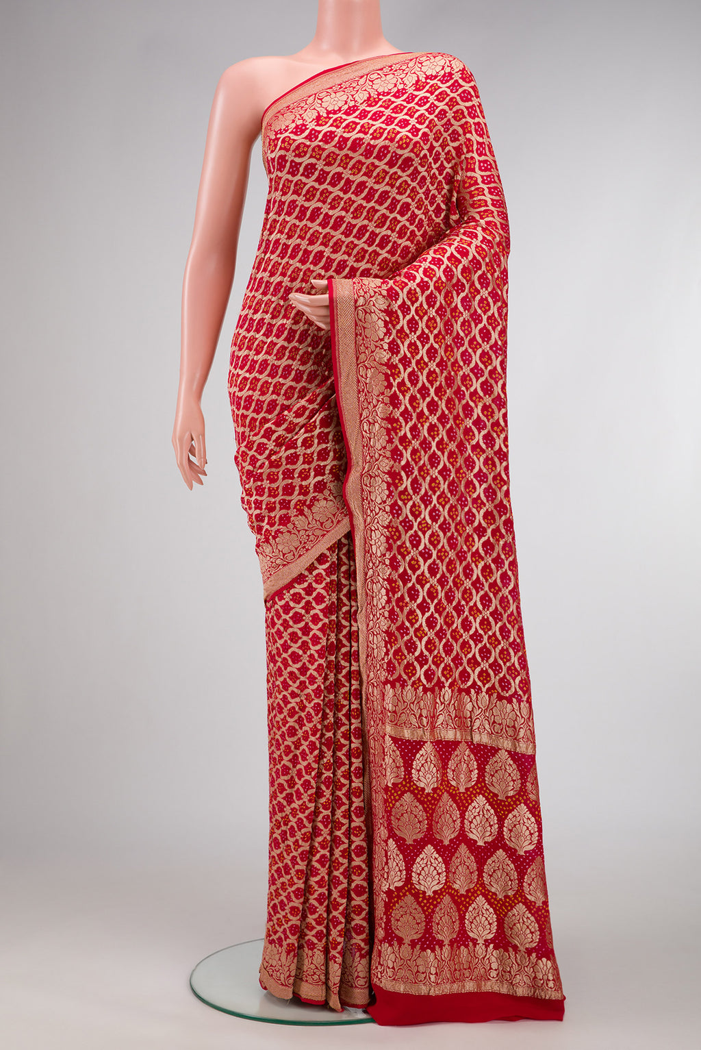 Red Dual Tone Banarasi Georgette Saree with Zari Brocade on the body and Fancy Border.  displayed on a mannequin