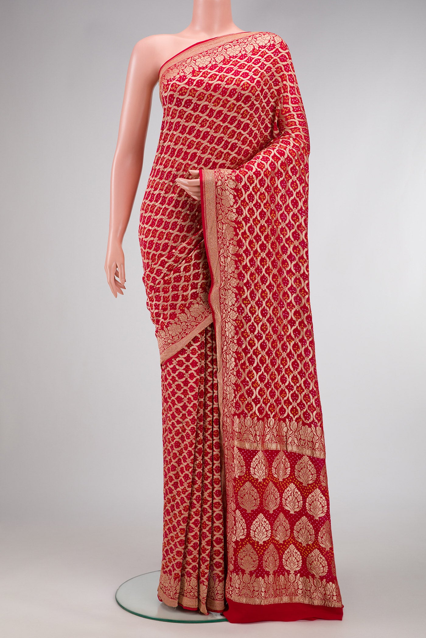 Red Dual Tone Banarasi Georgette Saree with Zari Brocade on the body and Fancy Border.  displayed on a mannequin