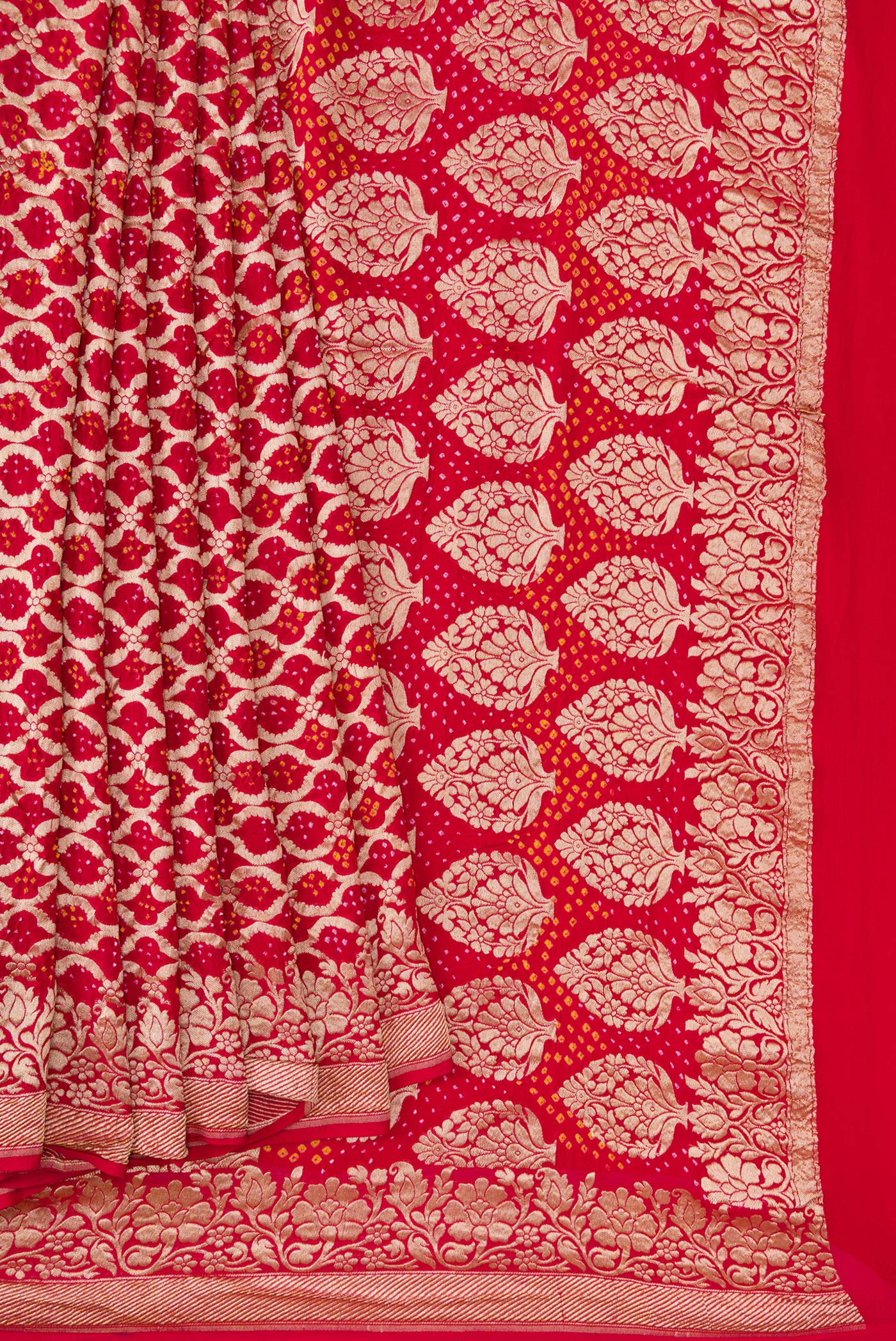 Pleats and pallu of Red Dual Tone Banarasi Georgette Saree with Zari Brocade on the body and Fancy Border. 