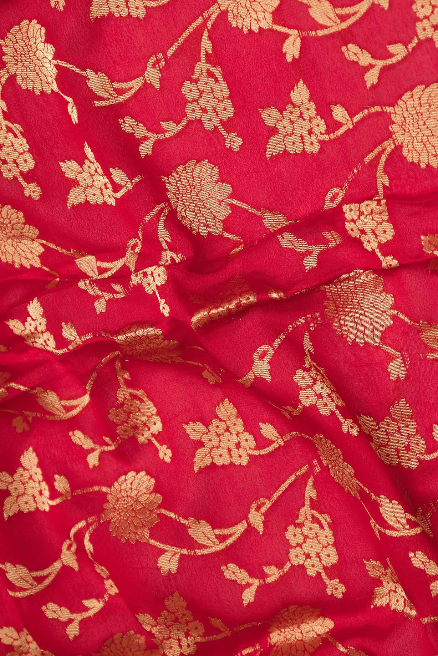 Close up of Red Mysore Crepe Saree with Zari Brocade on the body and Zari Border displaying folds